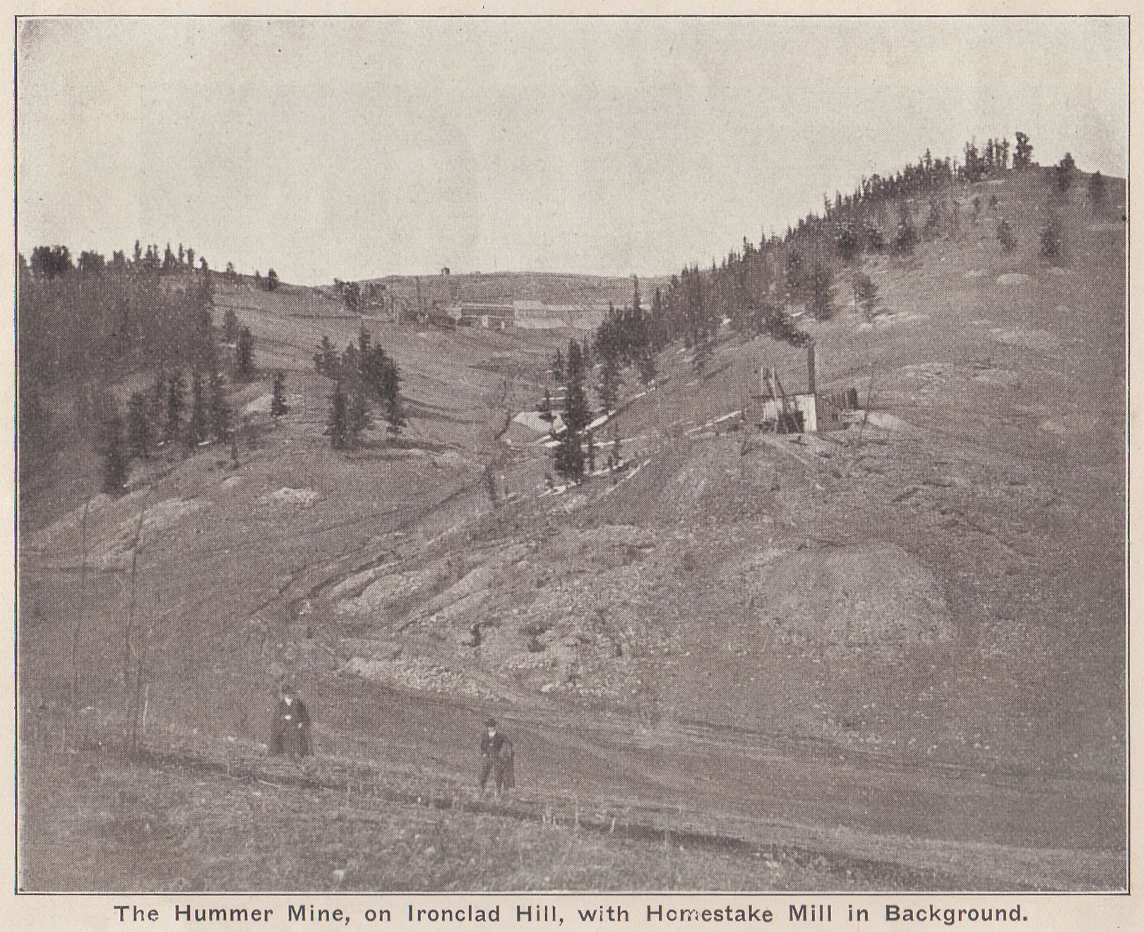 Being the image source is of print type, the quality is not always the best, but it is what it is, I have worked with it as best as I could. This view is titled 'Hummer Mine', and is a sort of overview type of view from slope of Bull Hill towards Ironclad Hill, where Gold Hill is outside the view at left side if the photographer had turned and snapped another view. Or if turned to the right, one would have been able to look uphill towards Midway, along the High Line. In such sense I wish I could been there, but this area is gone, a huge Open Pit made that happen…
   In the background, near center sideways and about 1/3 down from top is the large Homestake Mill, the smaller Ironclad-Homestake Mill is also in the view but quality is to bad to really see it, it is to the left of the large mill structure that is visible.