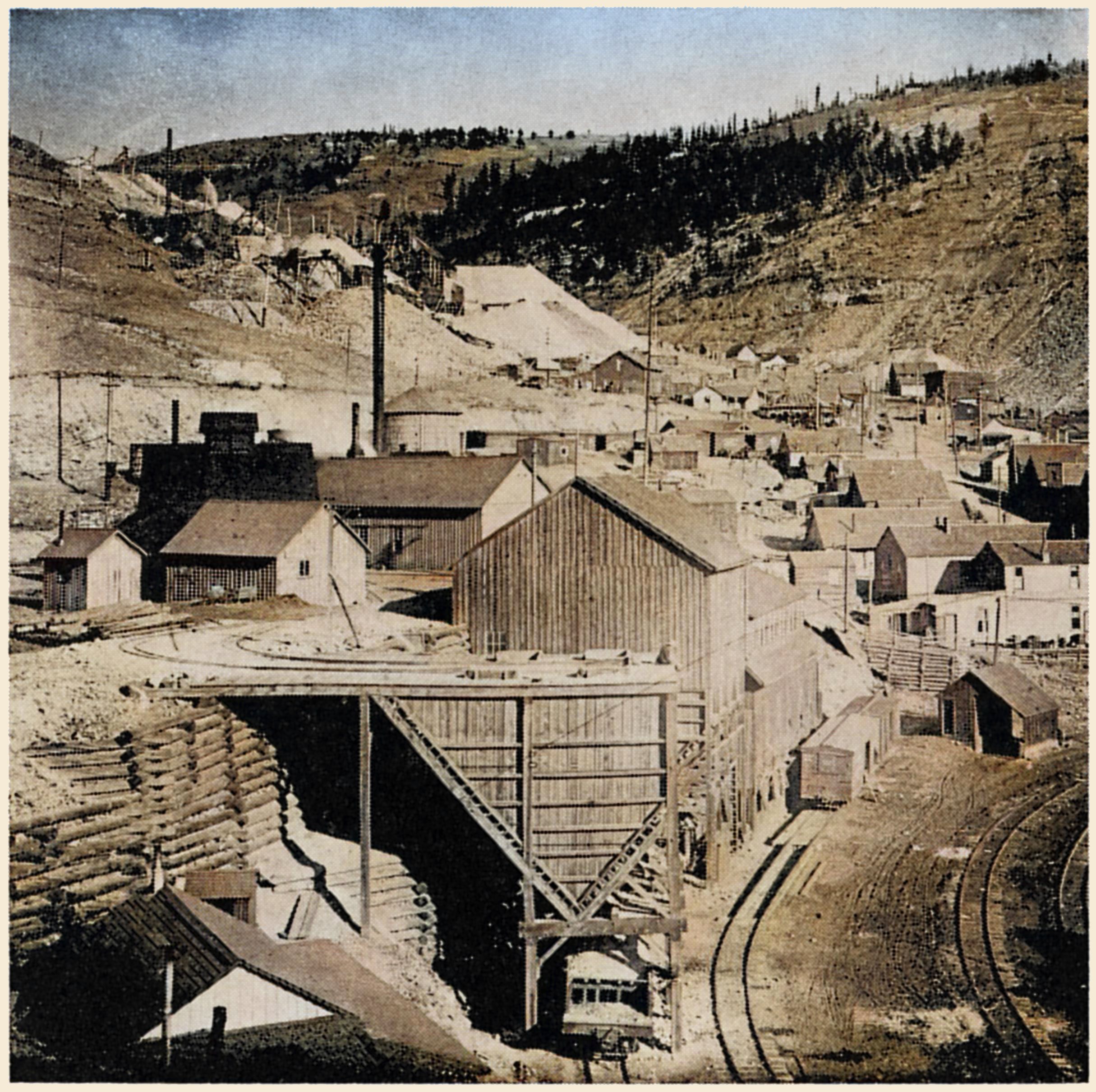 Scene at the Anaconda Mine in Squaw Gulch with an Ore Bin and an Ore House Seen in Foreground.