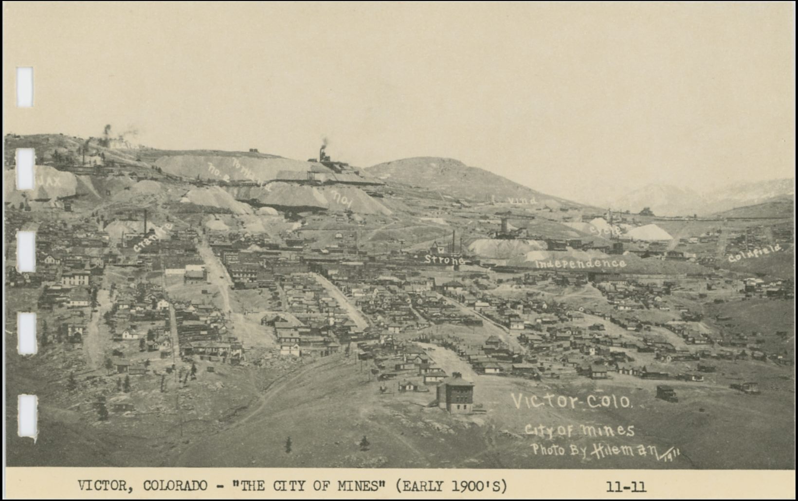 This view of Victor is looking north from Straub Mountain area. Photographed in 1911 by the Hileman as the view is credited to. Being this is from a printed card in a small more modern postcard folder it is not the greatest quality, but one gets an idea of the town and the many mines in and around it. In addition, in this view they are marked out, even if there is at least one error in that marking.
* In upper left quadrangle is the Portland No. 1 & No. 2 marked out, but the location of the No. 2 shaft of the Portland is NOT where this image gives it! Portland No. 2 shaft is in this view above the No. 1 shaft, seen a little left of the center of this view sideways. No. 2 Shaft of Portland is seen against the sky with No. 1 just below it, with the huge dumps where No.1 is written. The Granite, original shaft, is located where this card has written the No.2 text.
* Just behind and left of the huge smokestack of the Gold Coin shaft, marked in this view as Granite, is the main shaft of the Dead Pine. The dump is much easier seen then the mine itself.