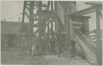 Group of Unknown Miners Posing at the Headframe of the Cameron Mine